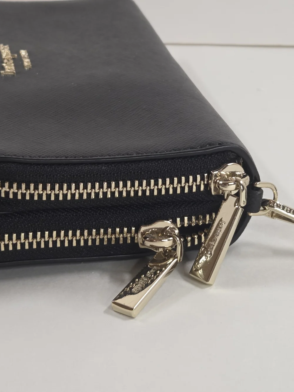 kate spade New York Black Saffiano Wristlet with Gold Logo